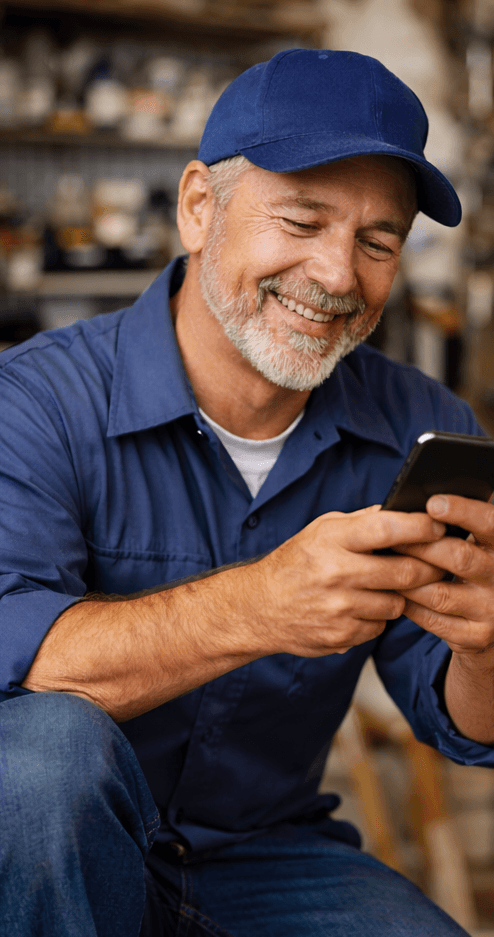 Tradesman using phone